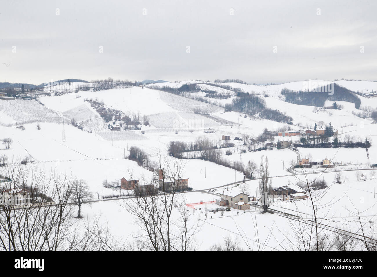 Panoramic view of the hills around Castell'Arquato covered by snow. Piacenza, Emilia Romagna, Italy. Stock Photo