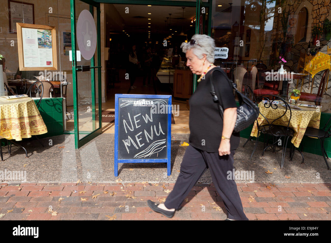 New menu sign in front of restaurant - Alexandria, Virginia USA Stock Photo