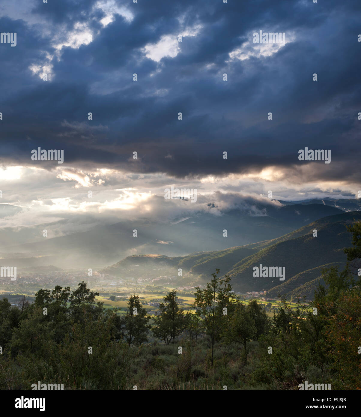 View from the village of Ortedo towards the town of La Seu d'Urgell, in the Pyrenees of Catalonia, Spain, after a thunderstorm Stock Photo