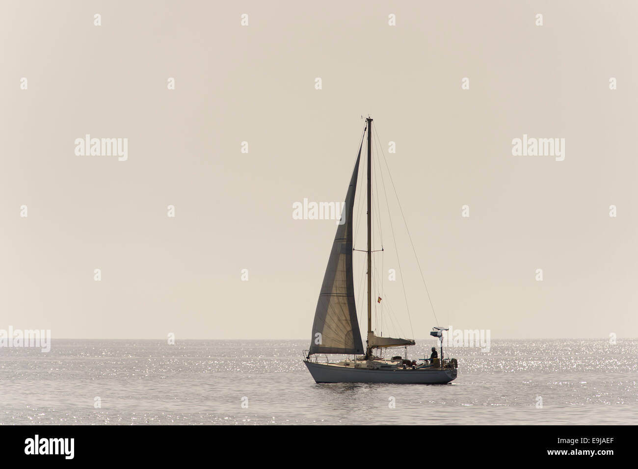 Sailing ship at sea on a still calm day. Stock Photo