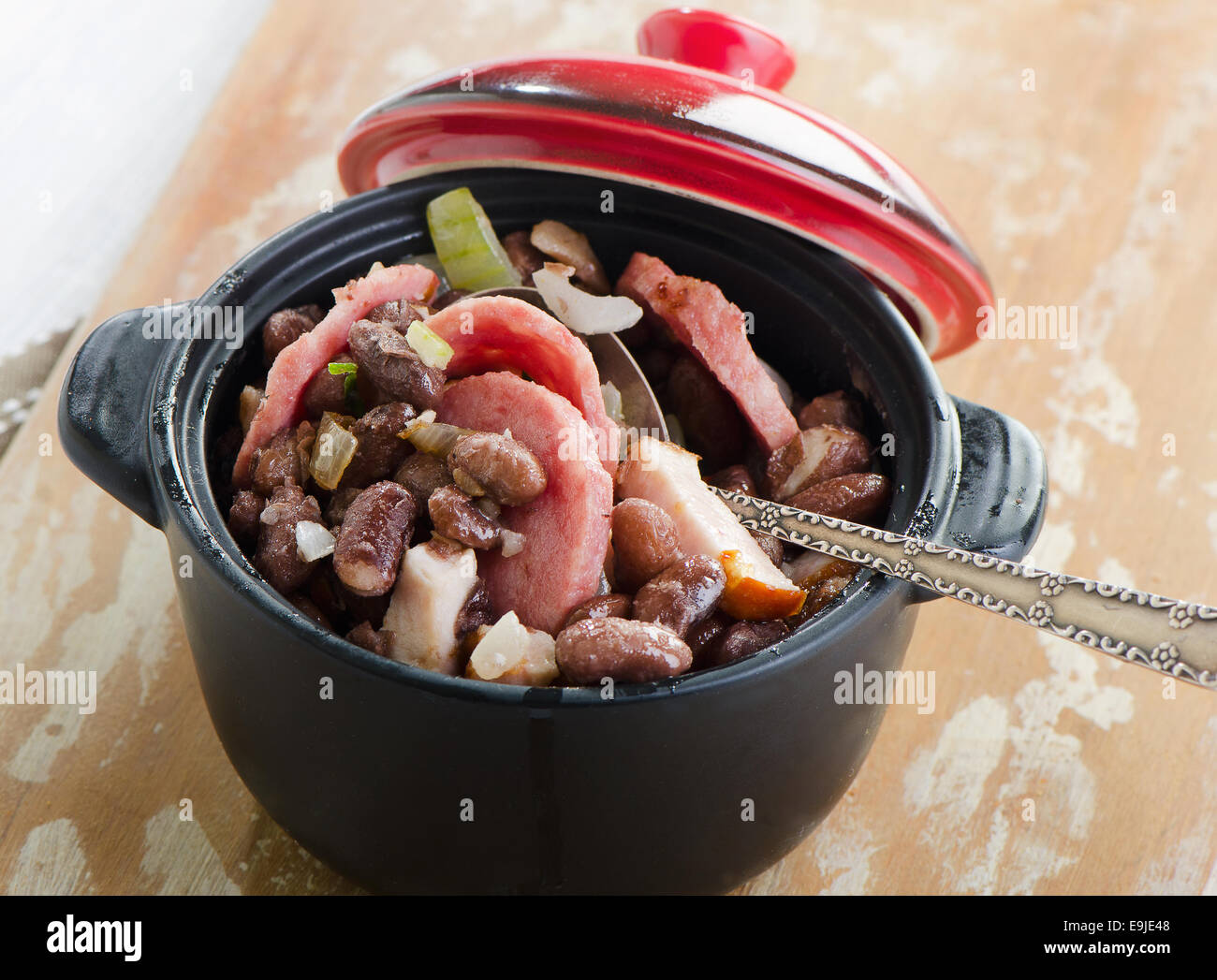 Stew of beans  and smoked sausages. Selective focus Stock Photo
