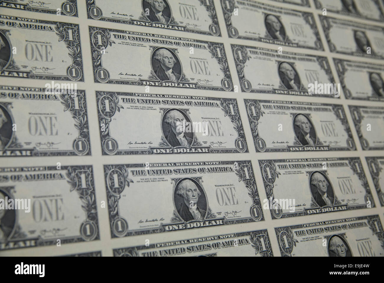 Uncut sheets of United States One Dollar ($1) bills during production at the Bureau of Engraving and Printing in downtown Washin Stock Photo