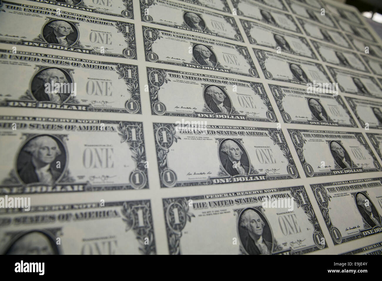 Uncut sheets of United States One Dollar ($1) bills during production at the Bureau of Engraving and Printing in downtown Washin Stock Photo