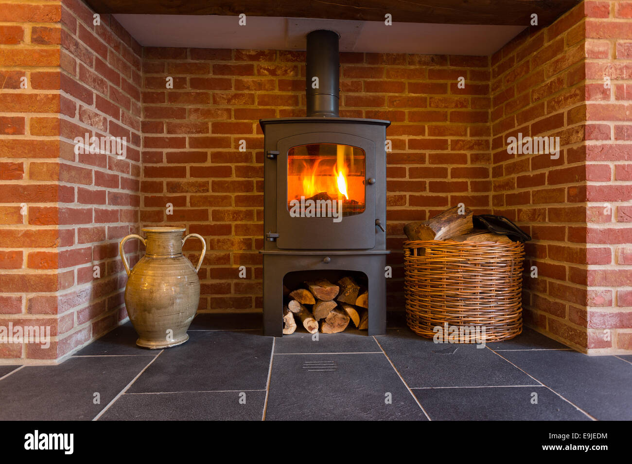 Wood Burning Stove In Brick Fireplace Stock Photo 74779872 Alamy
