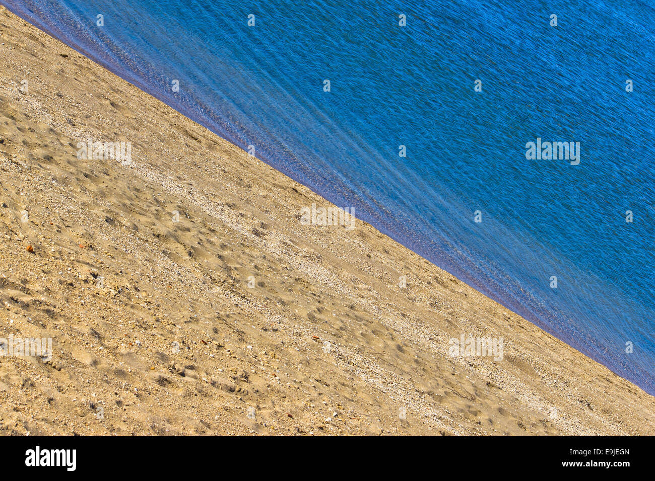 Sand beach and blue sea diagonal Stock Photo - Alamy