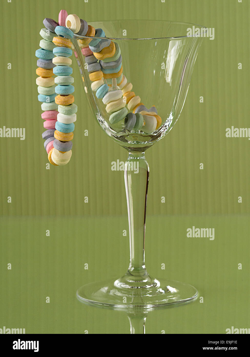 Candy necklace in a glass Stock Photo
