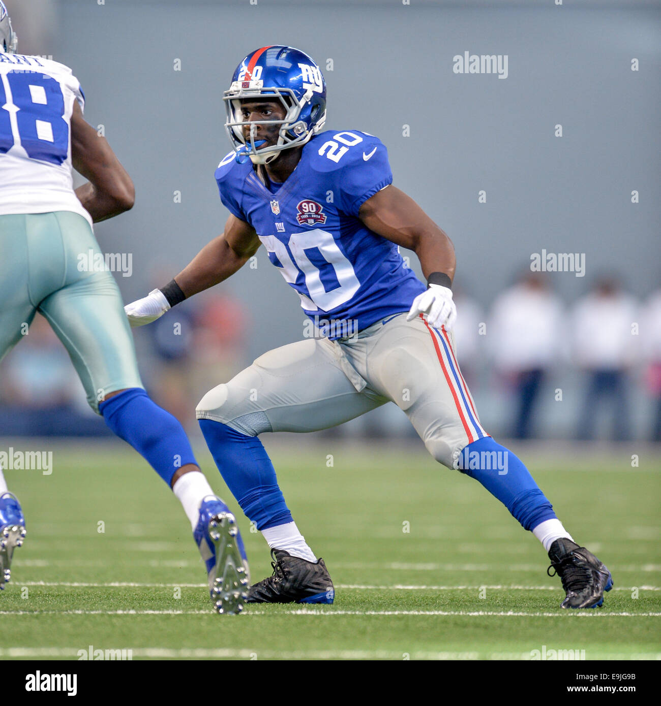 New York Giants Cornerback Prince Amukamara 20 At The Line Of Scrimmage Against Dallas Cowboys Wide Receiver Dez Bryant 88 In An Nfl Football Game Between The New York Giants And Dallas