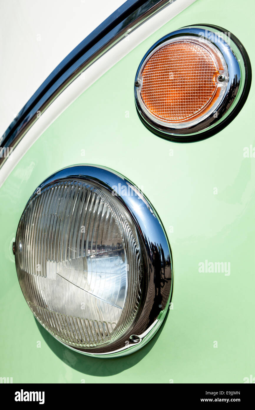 Headlight and winker of pastel green vintage Volkswagen microbus Stock Photo