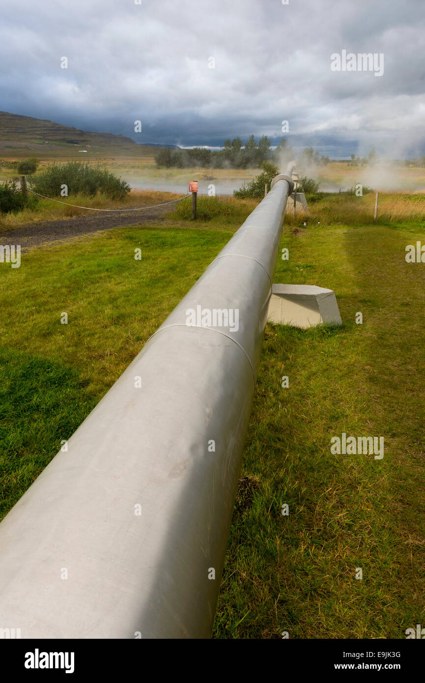 Pipeline with boiling water for the supply of Akranes and Borgarnes, Deildartunguhver, highest-flow hot spring of Iceland with Stock Photo