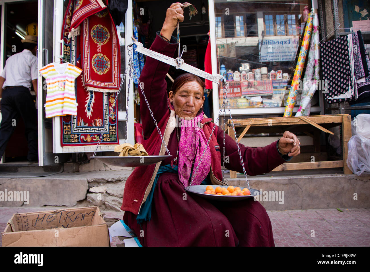 Woman selling apricots, Leh, Ladakh, Jammu and Kashmir, India Stock Photo