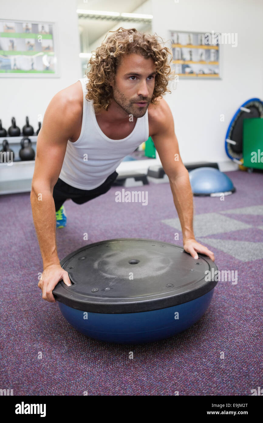 Man doing crossfit fitness workout in gym Stock Photo - Alamy