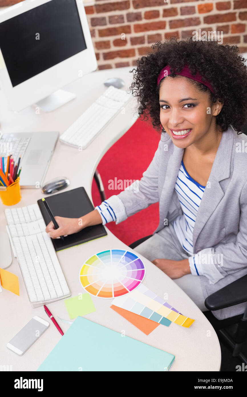 Female photo editor using digitizer in office Stock Photo Alamy