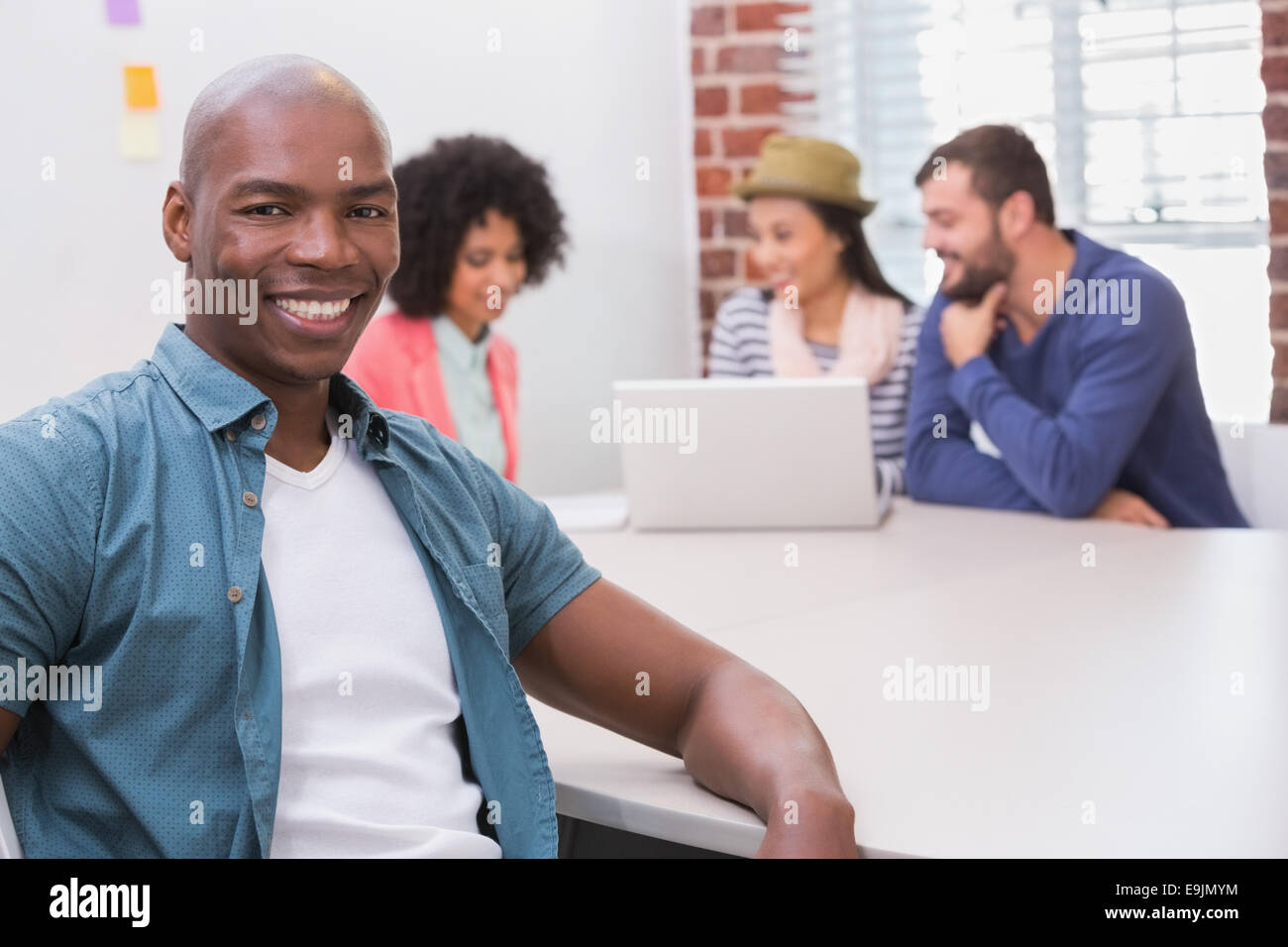 Portrait of man in business meeting Stock Photo - Alamy