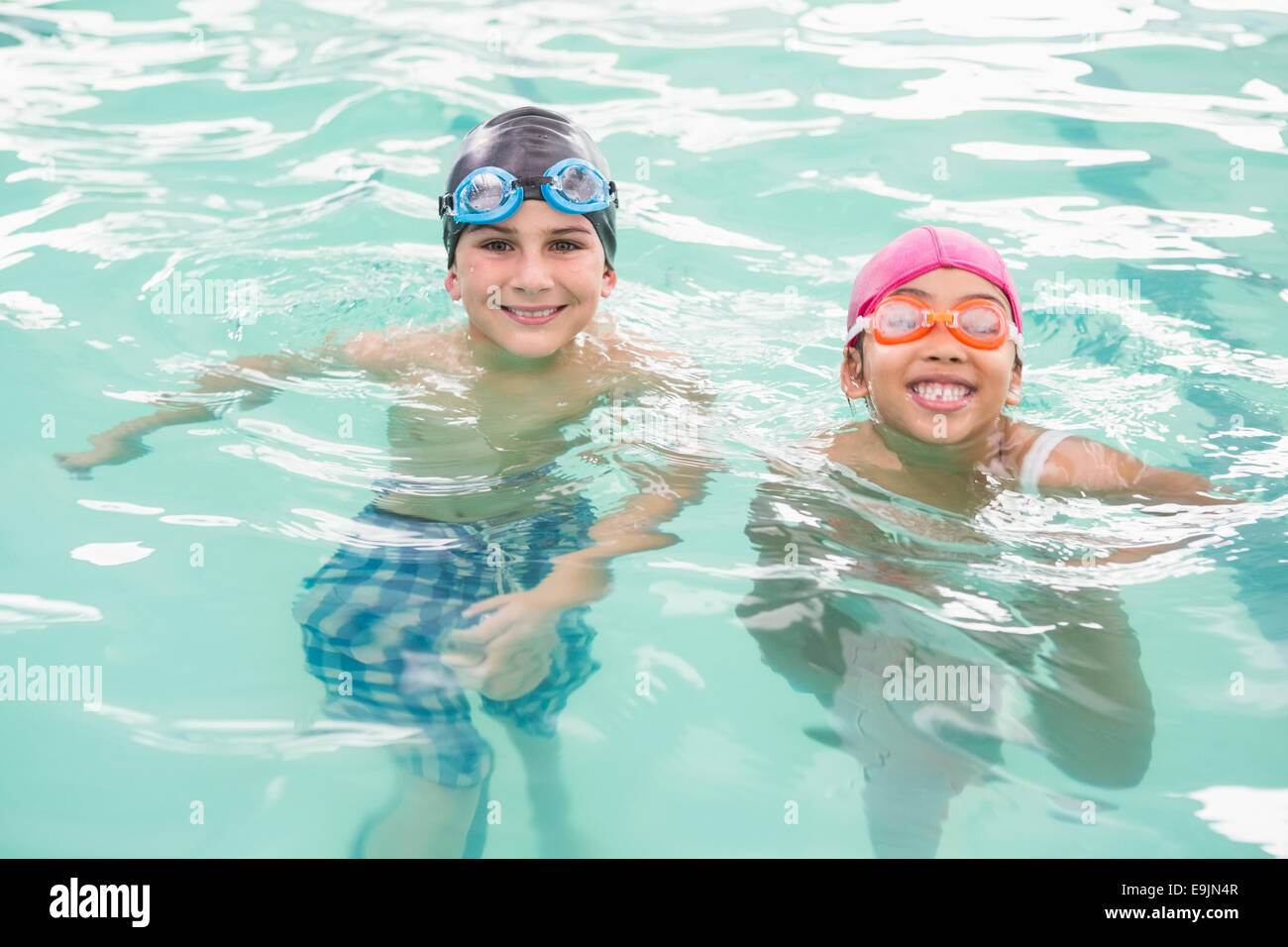 Cute swimming class in the pool Stock Photo