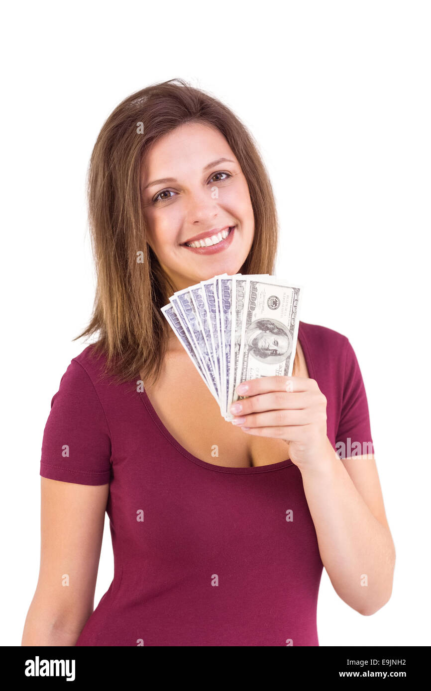 Pretty brunette showing wad of cash Stock Photo