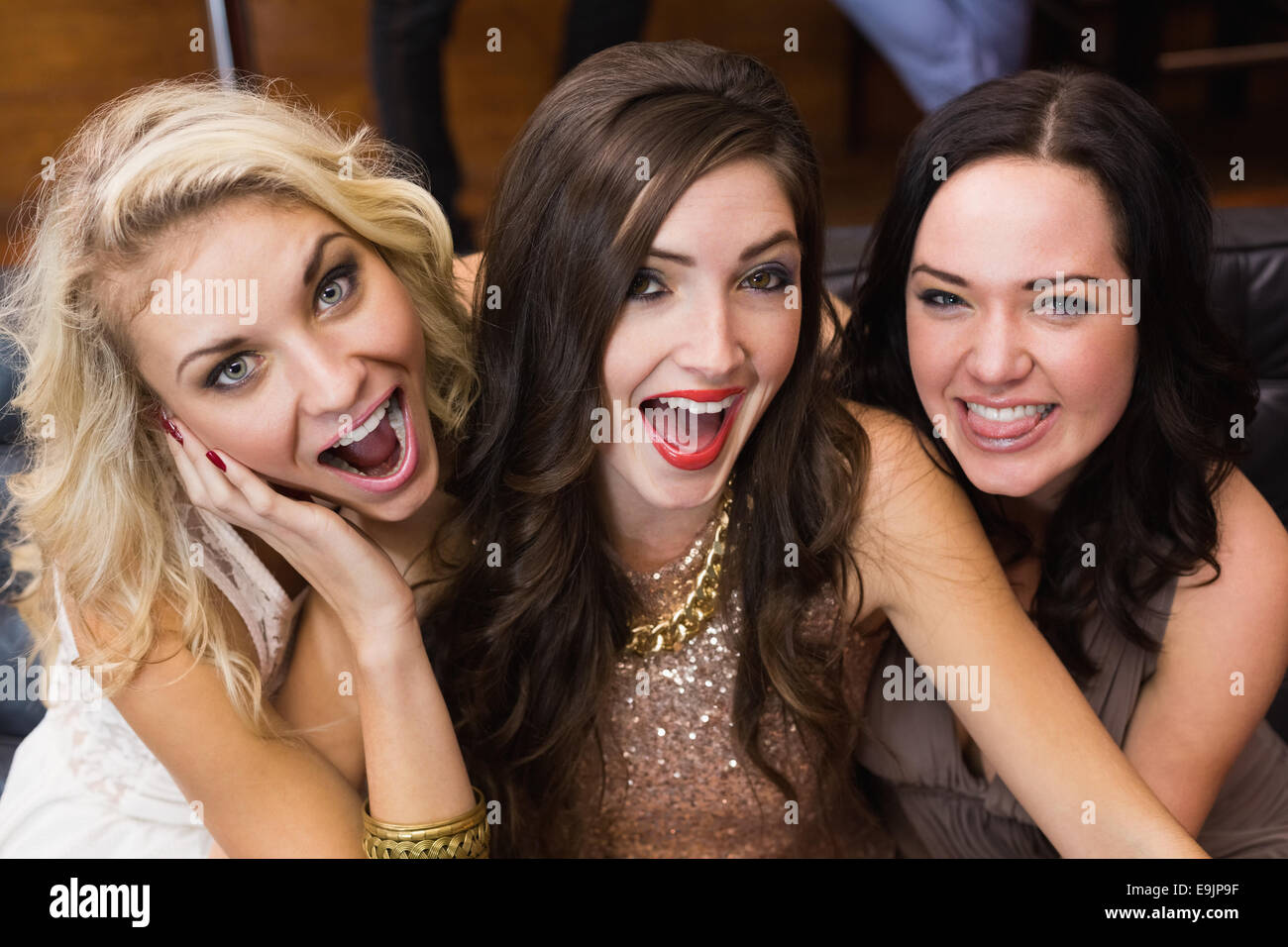 Happy friends making silly faces Stock Photo