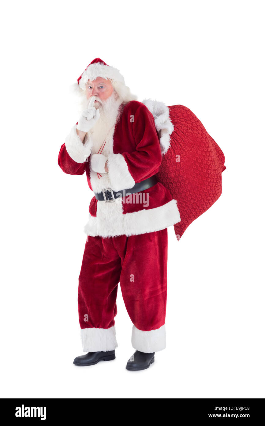 Santa asking for quiet with bag Stock Photo
