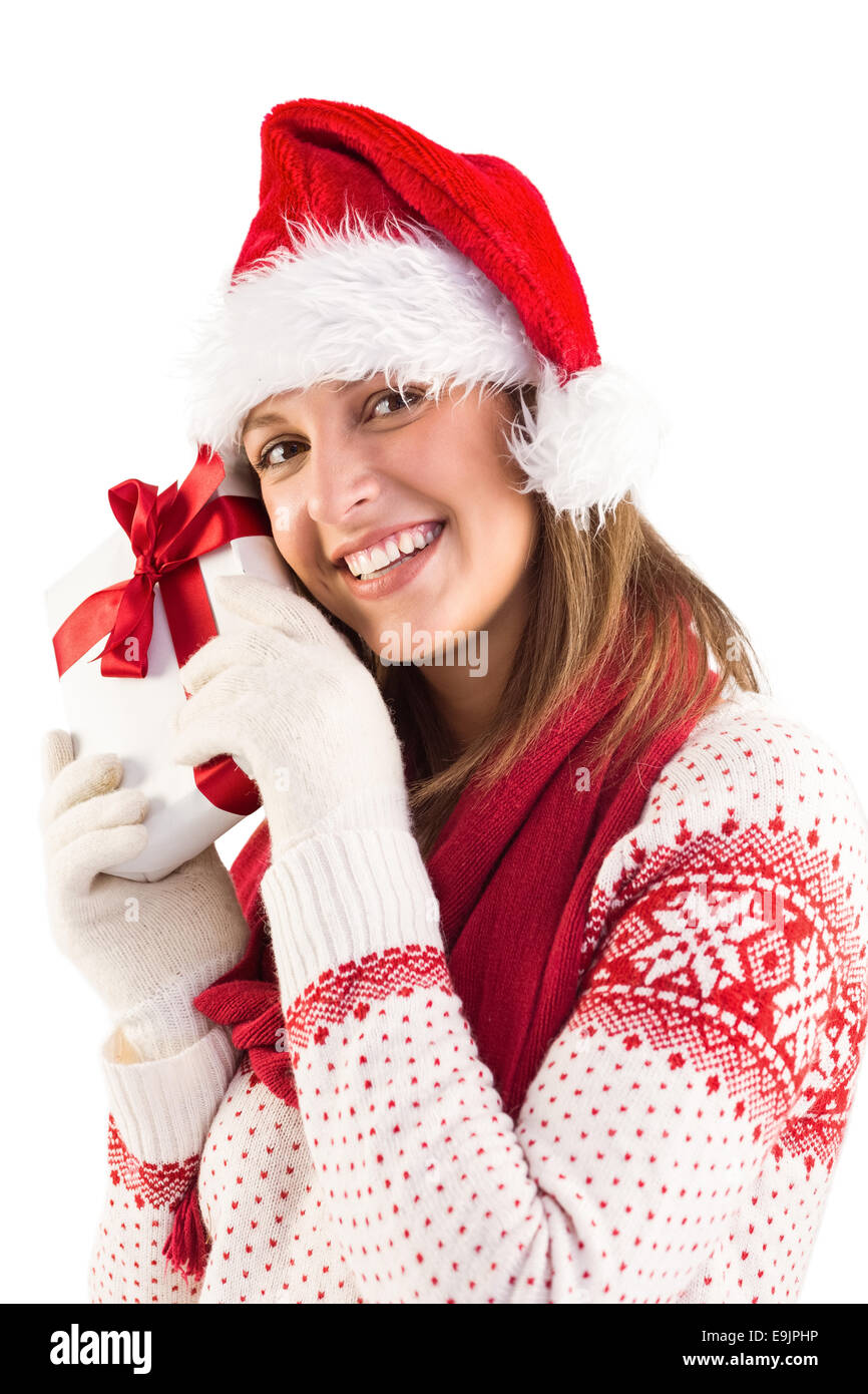 Portrait of smiling young woman holding gift Stock Photo - Alamy