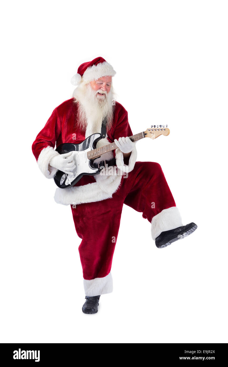 Santa Claus has fun with a guitar Stock Photo
