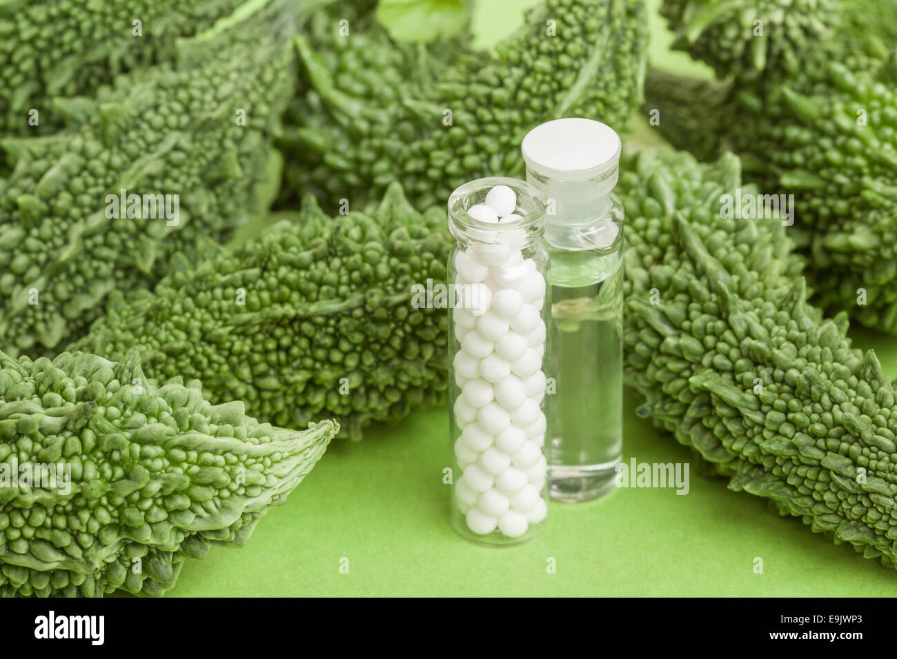 A Homeopathy Concept With Homeopathic Medicine Pictured Along With
