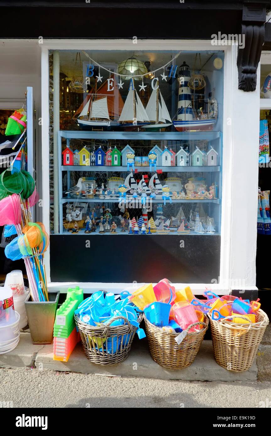 Buckets and spades for the beach on sale outside a seaside gift shop St