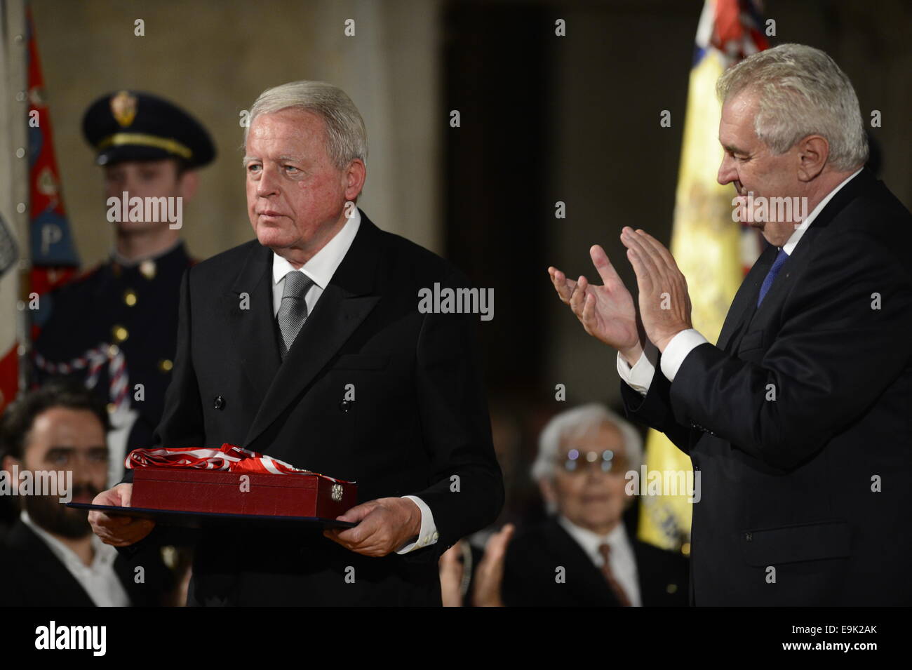 Prague, Czech Republic. 28th Oct, 2014. Czech President Milos Zeman (right) bestowed the Order of the White Lion, the highest Czech state award, on former Austrian chancellor Franz Vranitzky at a ceremony at Prague Castle today, on Tuesday, October 28, 2014. Vranitzky have been decorated for his outstanding contribution for the benefit of the Czech Republic. Credit:  CTK/Alamy Live News Stock Photo