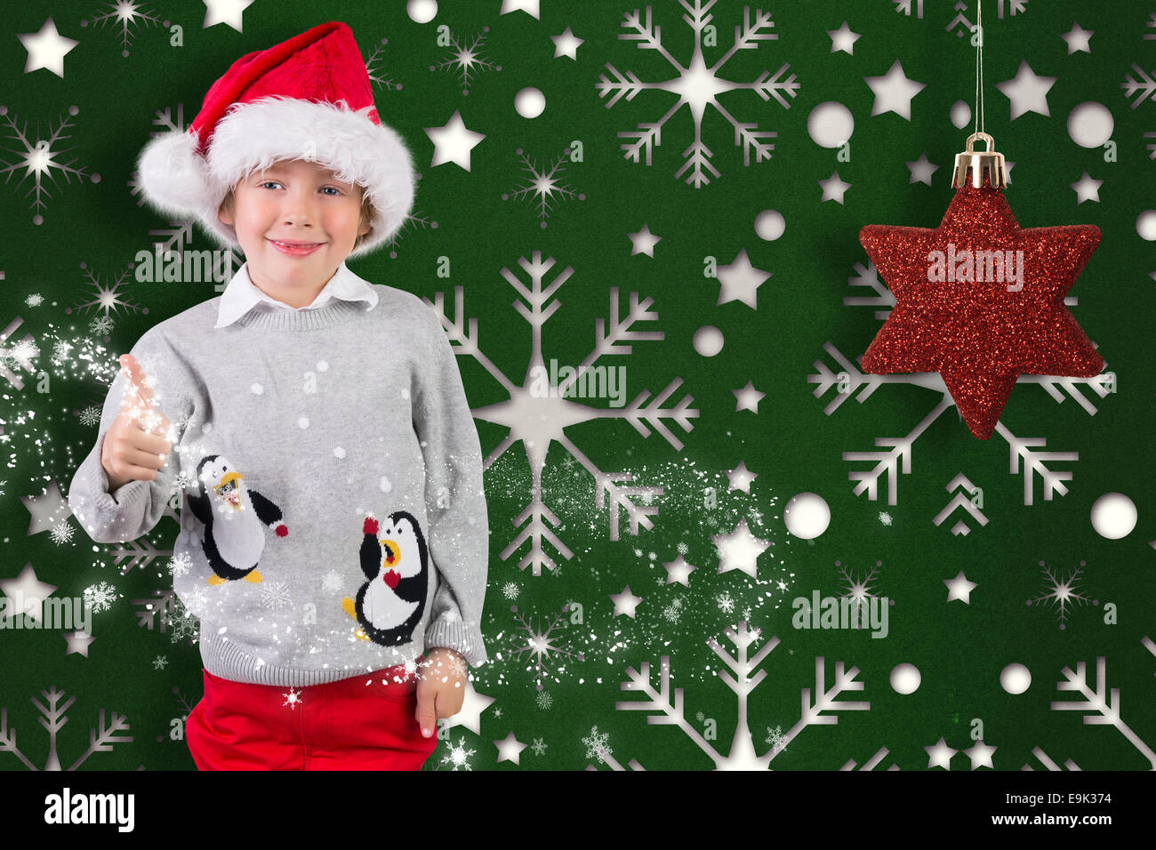 Festive and smiling boy giving a thumbs up Stock Photo - Alamy