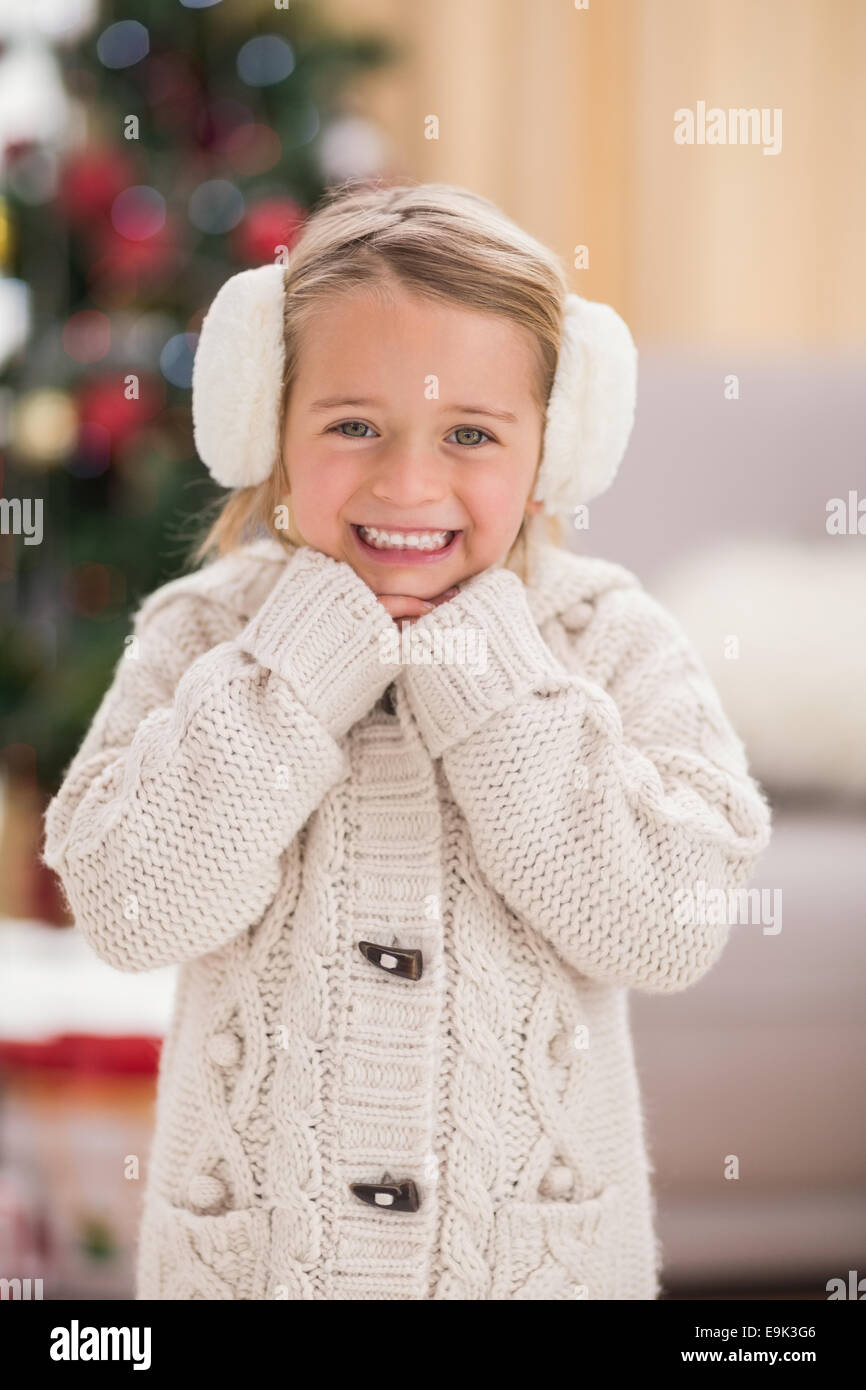Festive little girl smiling at camera Stock Photo - Alamy