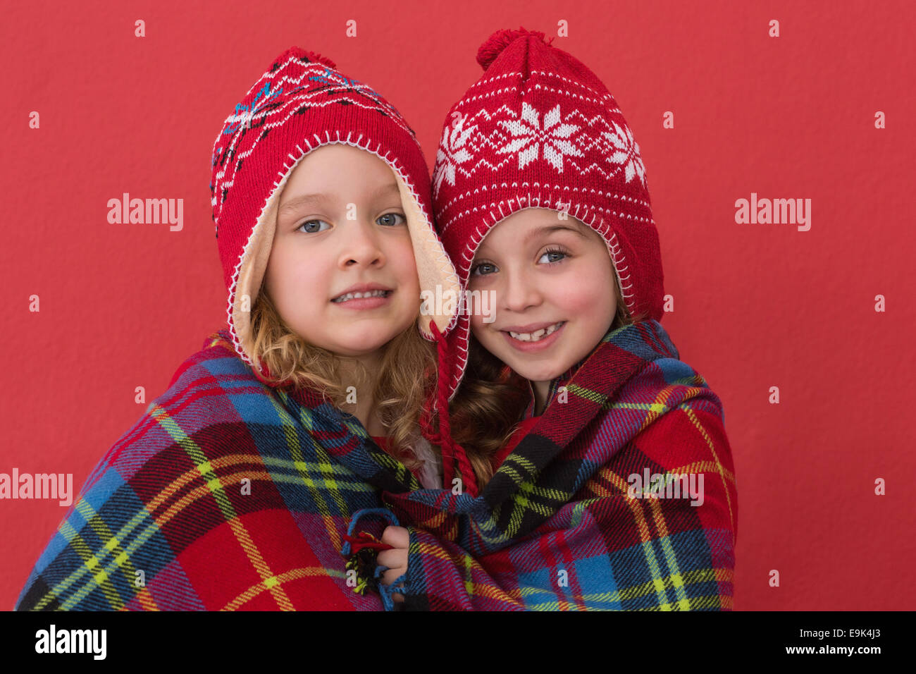 Festive little girls smiling at camera Stock Photo - Alamy