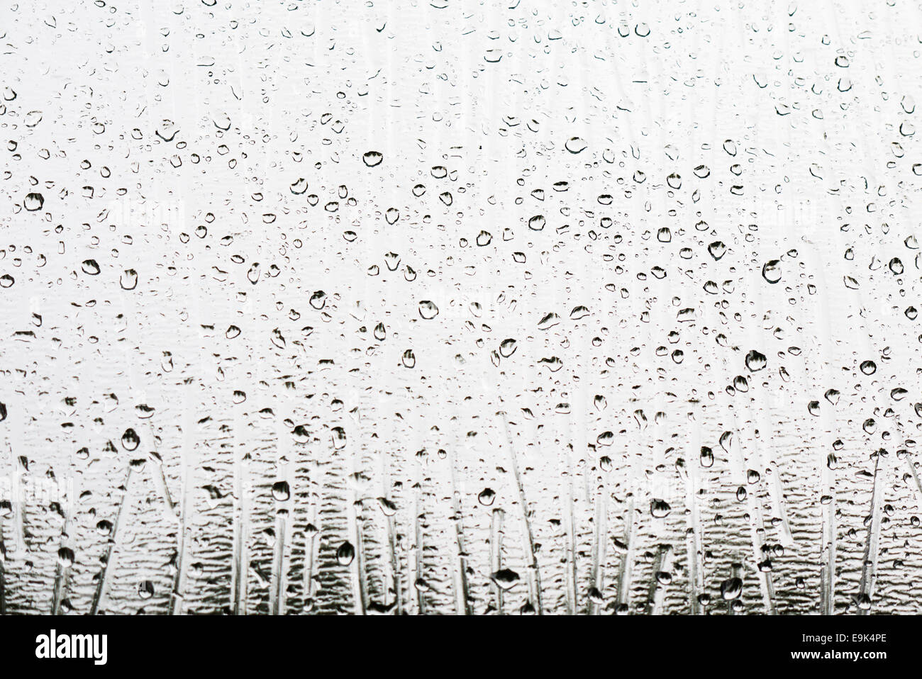droplets of rain on frosted glass clear Stock Photo - Alamy