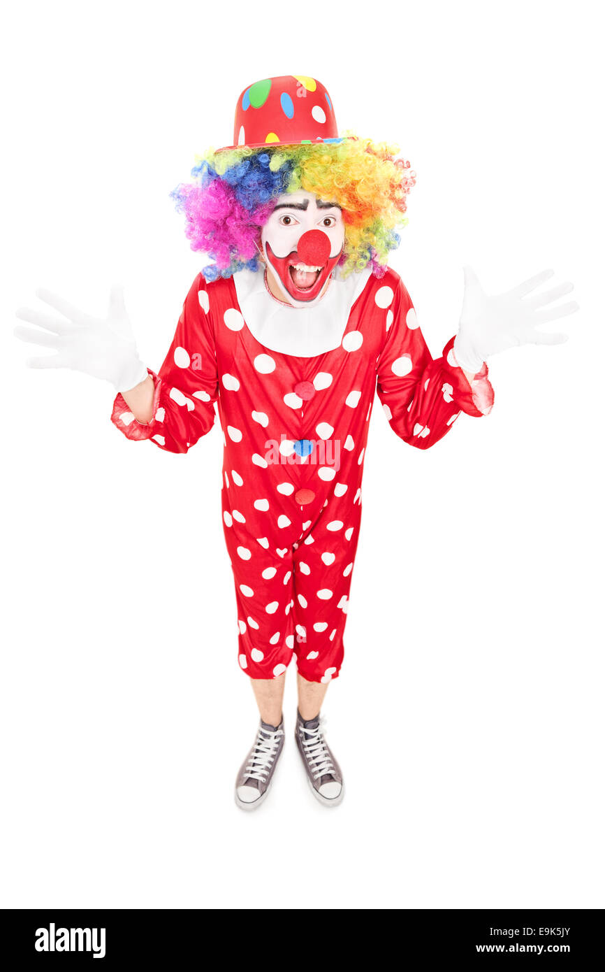 Happy male clown gesturing with hands isolated on white background Stock Photo