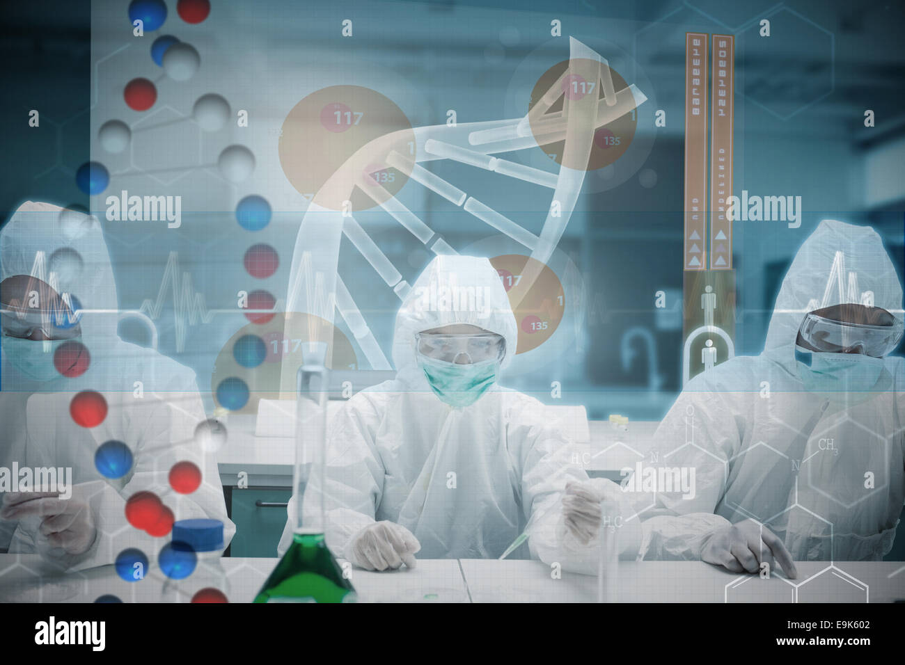 Composite image of scientists working in the lab with futuristic interface Stock Photo