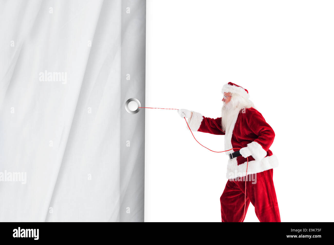 Santa claus pulling a rope Stock Photo Alamy