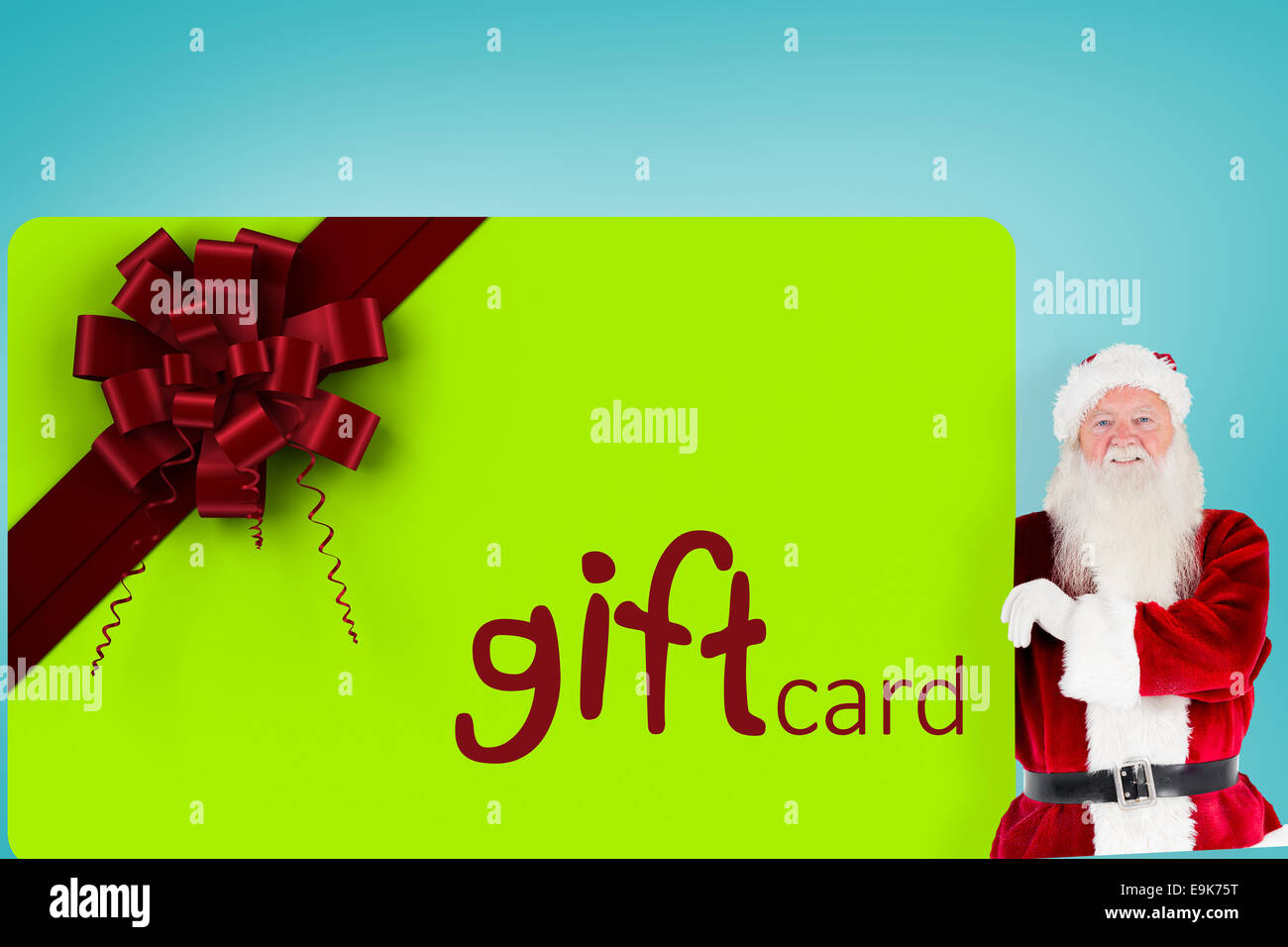 Composite image of santa claus showing blackboard Stock Photo - Alamy