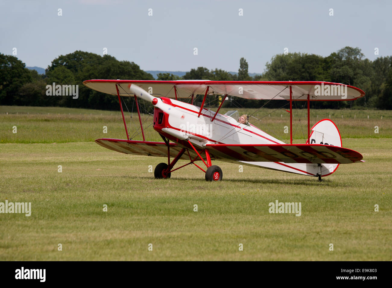 Stampe SV4C (Modified) G-OODE landing on grass runway at Headcorn Airfield Stock Photo