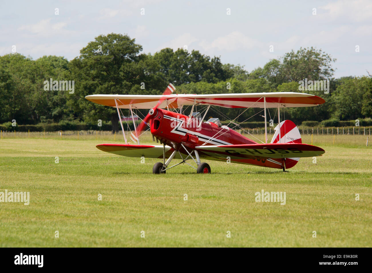 Stampe SV4C (Modified) G-HJSS taxiing from grass runway at Headcorn Airfield Stock Photo