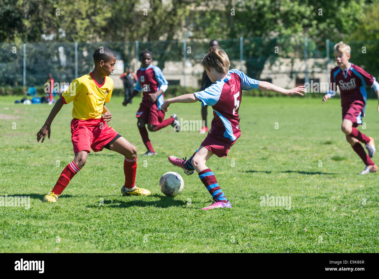 Two young football players of U15 fight for the ball, Cape Town, South Africa, Cape Town, South Africa Stock Photo