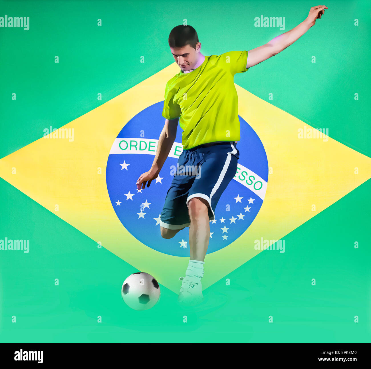 Football player shooting in front of Brazil National Flag Stock Photo