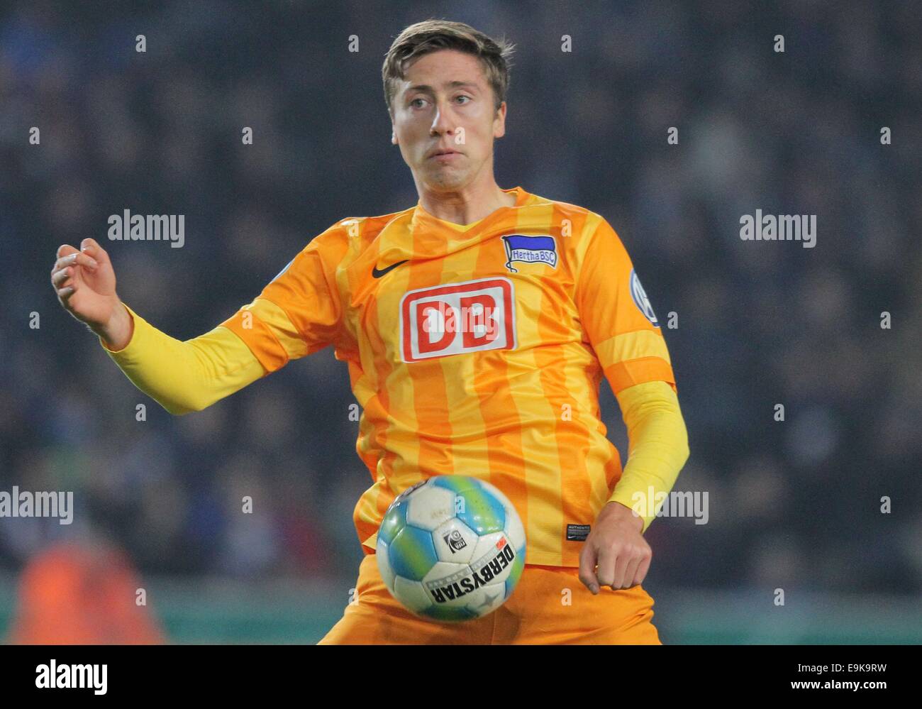 Bielefeld, Germany. 28th Oct, 2014. Berlin's Jens Hegeler with the ball during the German DFB-Cup match between Arminia Bielefeld and Hertha BSC at the Schueco Arena in Bielefeld, Germany, 28 October 2014. Credit:  dpa picture alliance/Alamy Live News Stock Photo