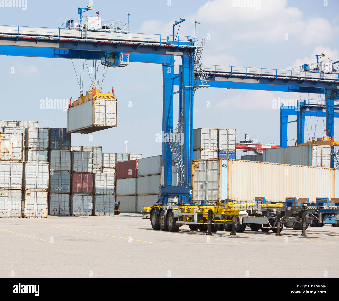 Cargo containers in shipping yard Stock Photo Alamy