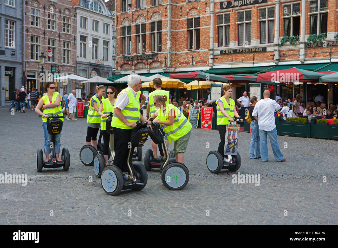 TOURISTS ON SEGWAY SIGHTSEEING TOUR IN BRUGES Stock Photo