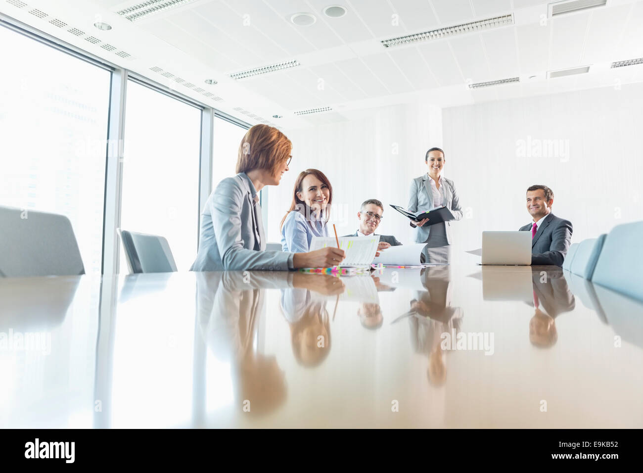 Businesspeople in conference room Stock Photo