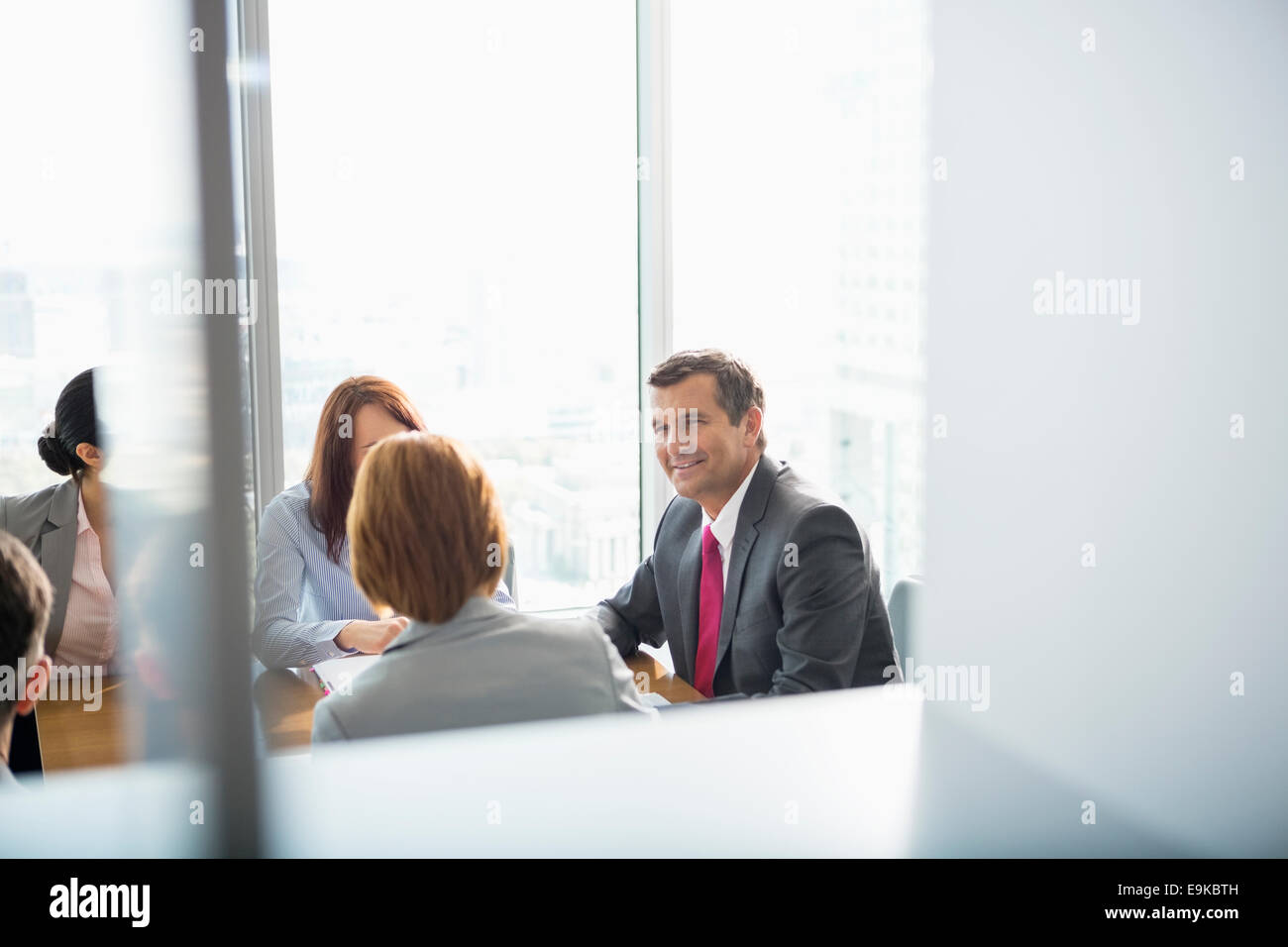Businesspeople in conference room Stock Photo