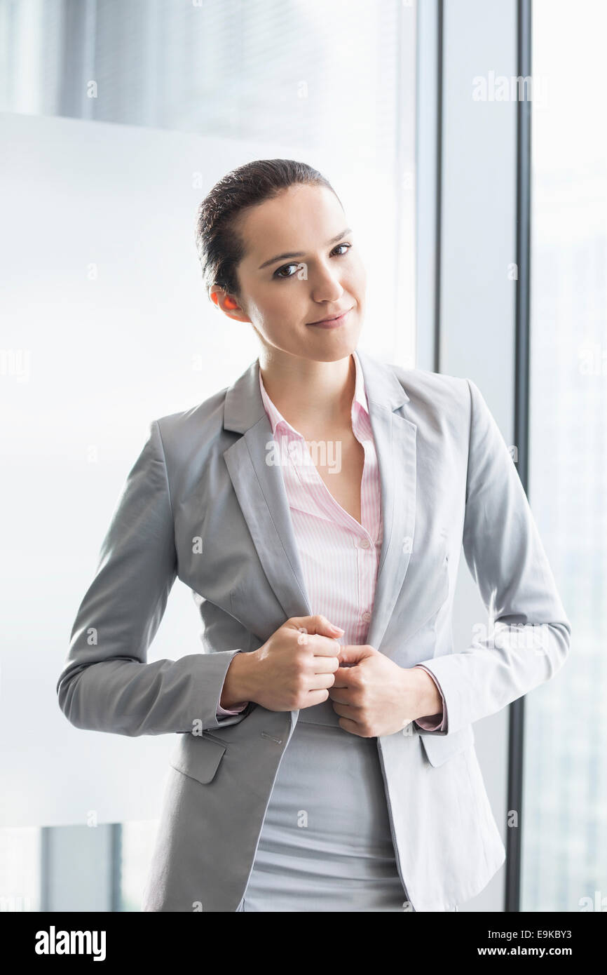 Portrait of confident young businesswoman in office Stock Photo - Alamy