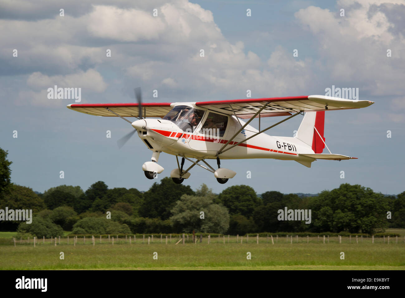 Ikarus C42 FB100 G-FBII taking-off from Headcorn Airfield Stock Photo