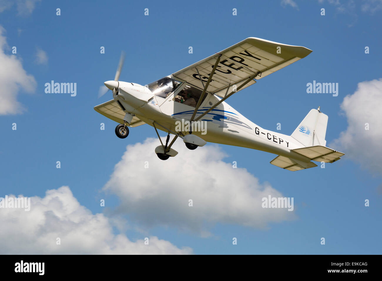 Ikarus C42 FB80 G-CEPY in flight after taking off from Headcorn Airfield Stock Photo