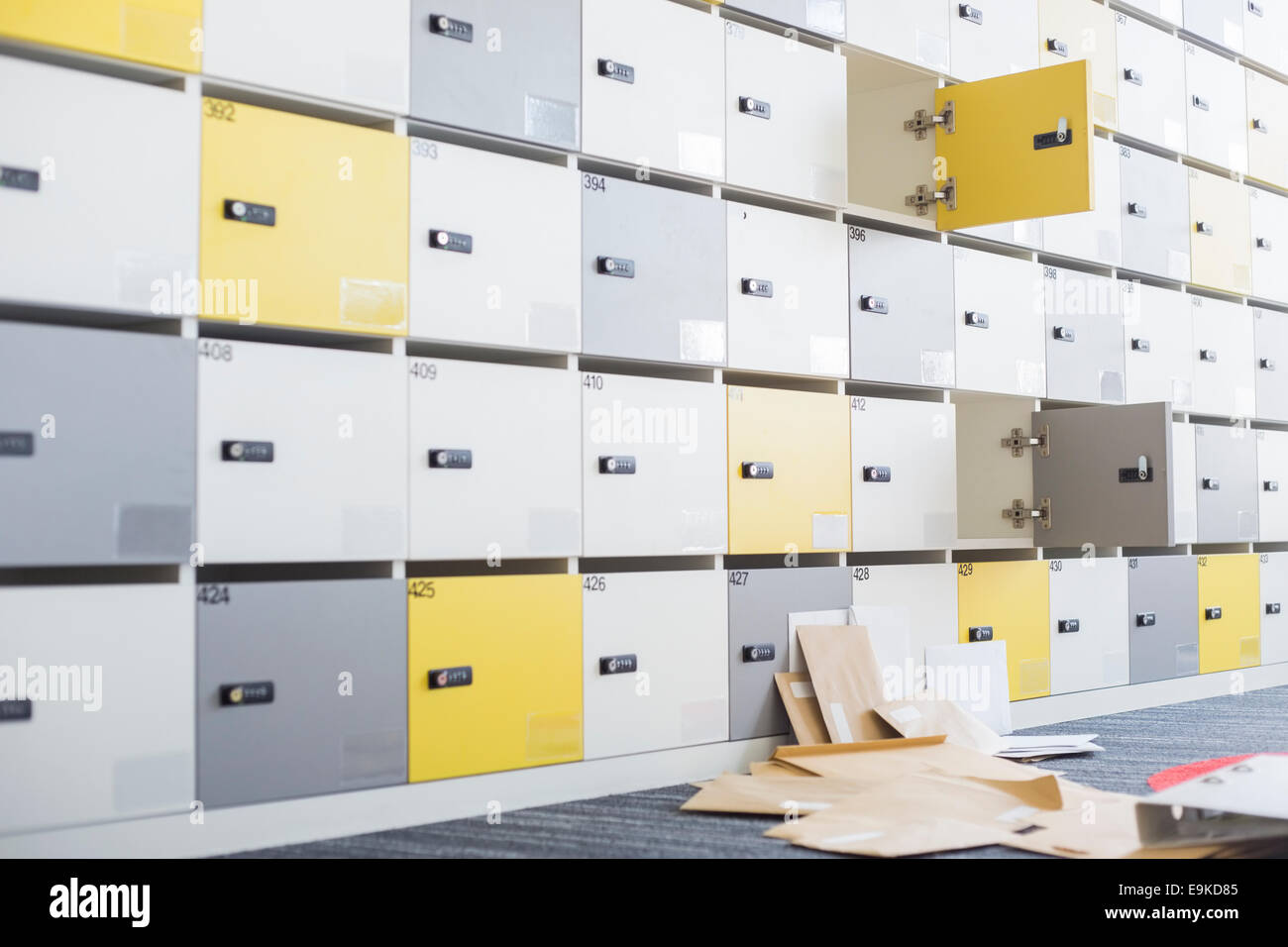 File Lockers Room Files fallen in locker room at creative office Stock Photo - Alamy