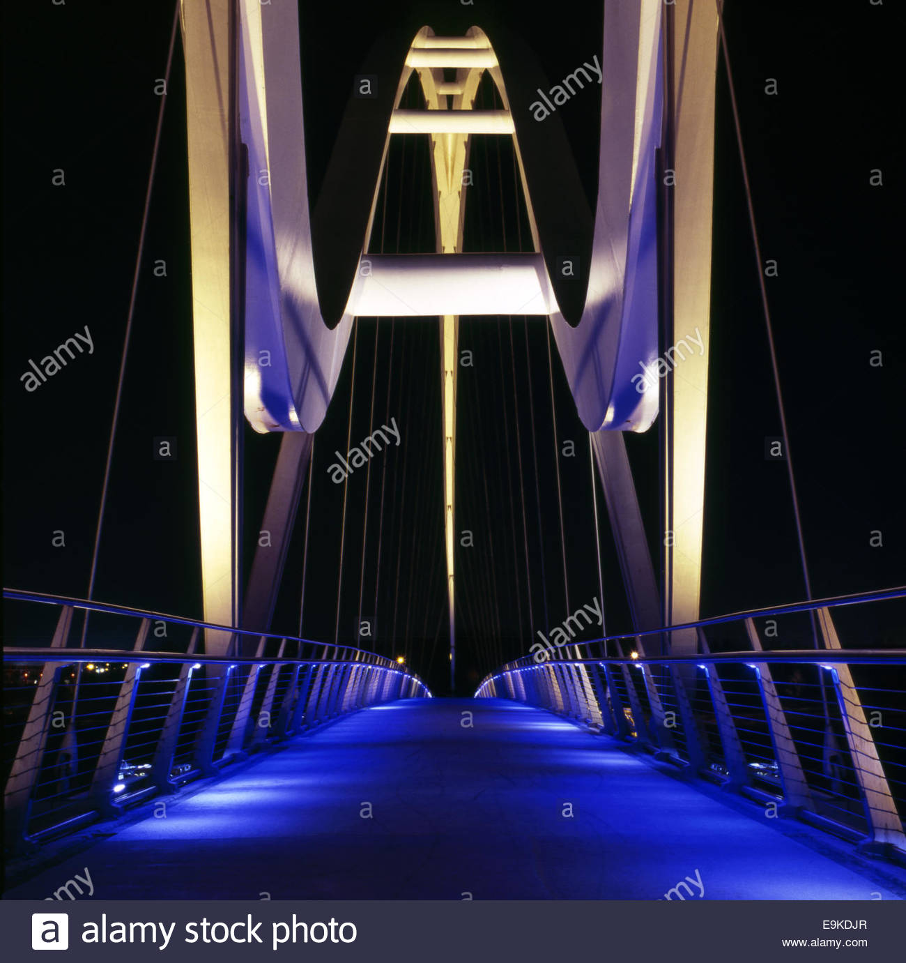 The Infinity Bridge (pedestrian & cyclist route) at night, across the River Tees, in Stockton-on-Tees, UK. Stock Photo