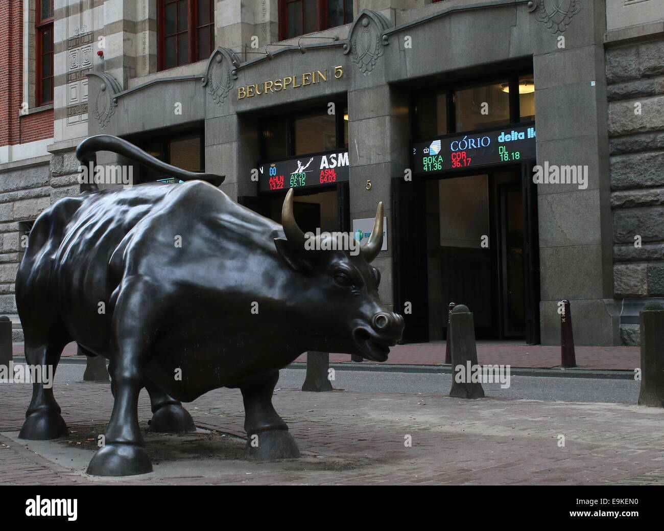 Statue of a  bull in front of the Amsterdam stock Exchange at Beursplein in the Dutch capital, made by sculptor Arturo Di Modica Stock Photo