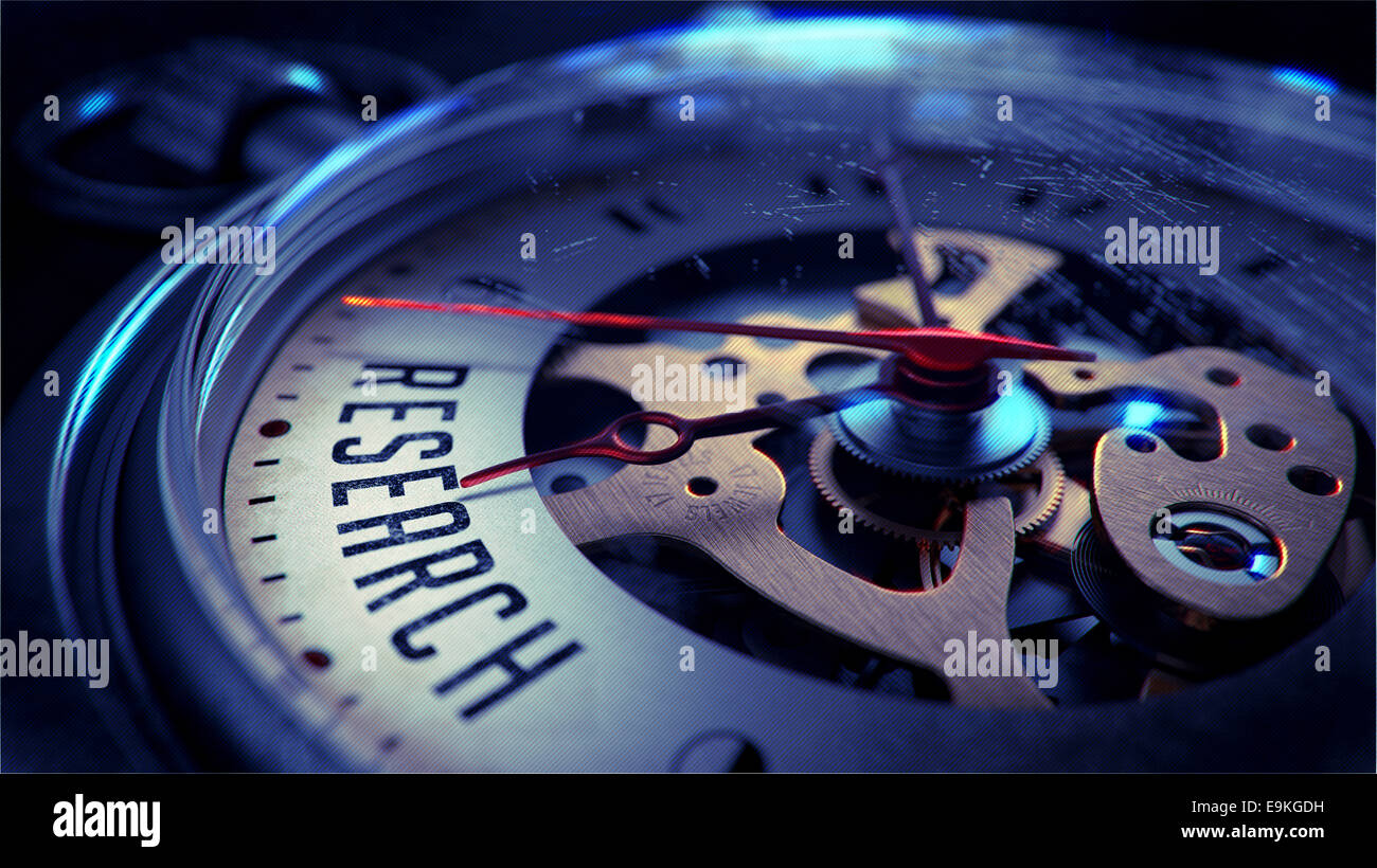 Research on Pocket Watch Face with Close View of Watch Mechanism. Time Concept. Vintage Effect. Stock Photo
